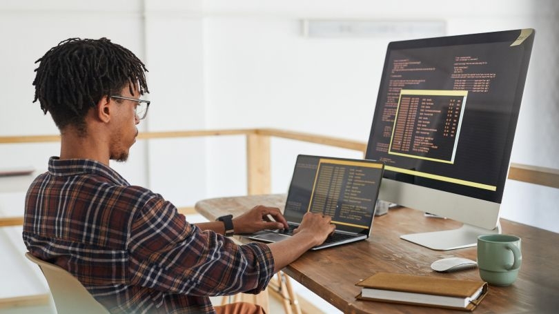 Person using computer to program